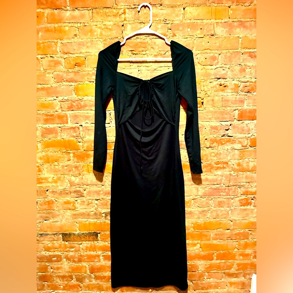 Dark green knit dress by Reformation with keyhole front detail